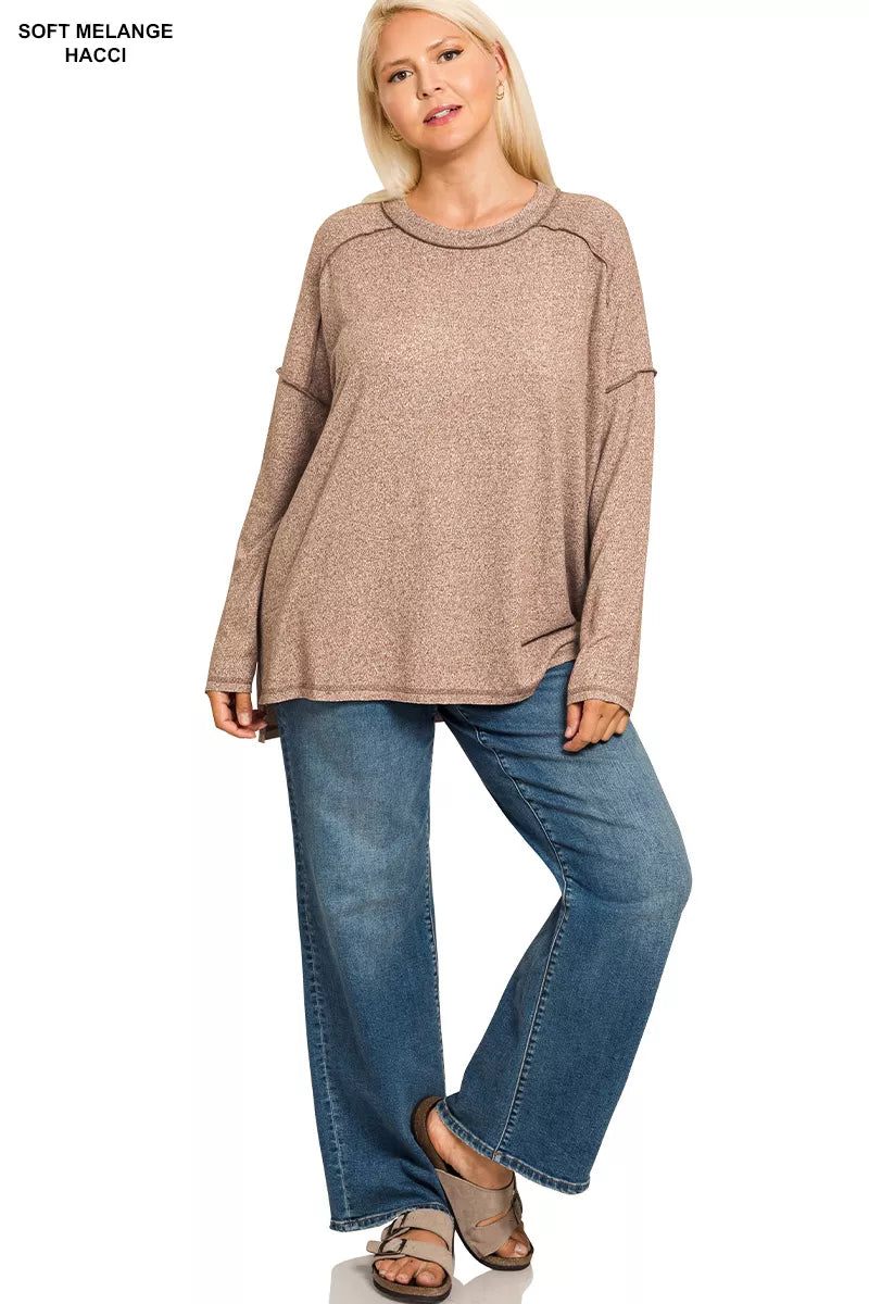 Melange hacci exposed seam hi low tee side view showing hi low hem