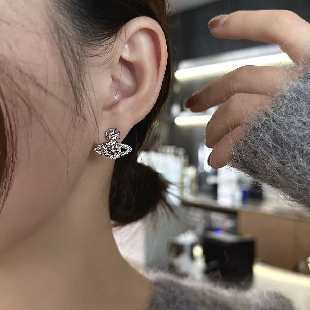 Moissanite sterling silver planet earrings front view