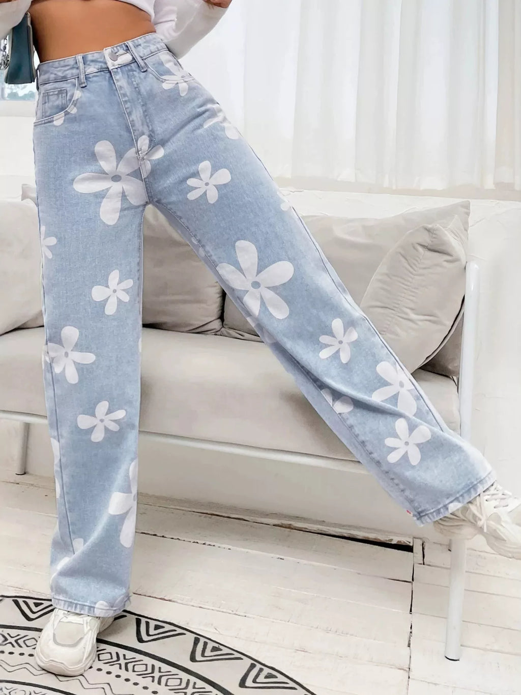 Floral detail close up on black denim