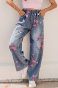 Floral print elastic waist wide leg jeans front view on model