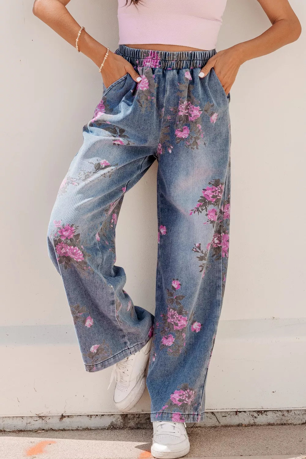 Floral print elastic waist wide leg jeans front view on model