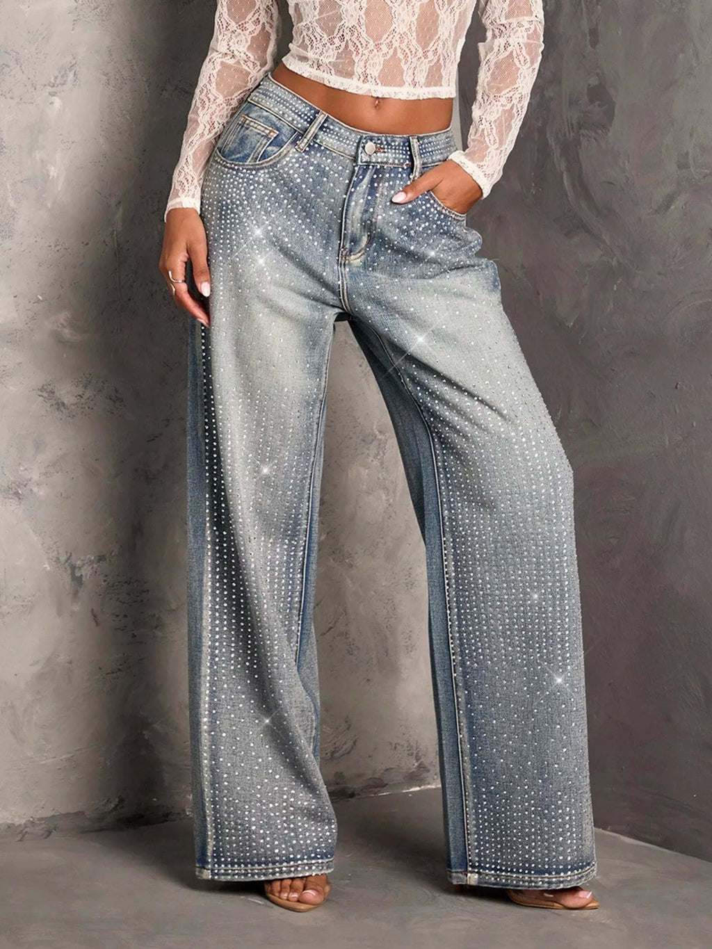 Rhinestone sparkle detail on blue denim