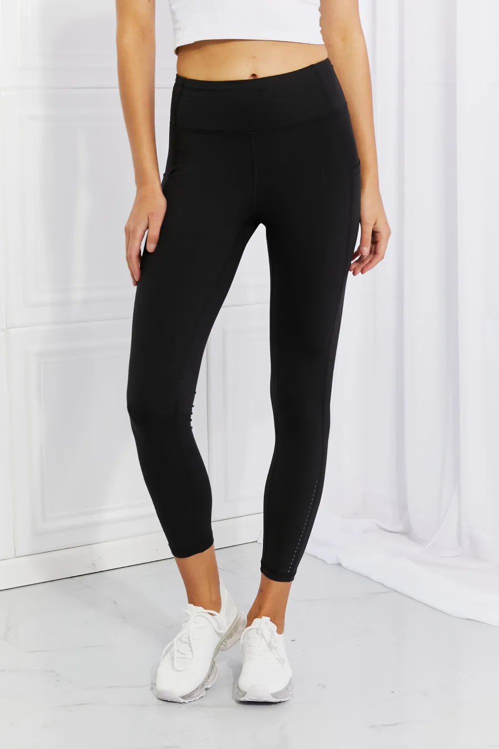 Black reflective dot active leggings front view