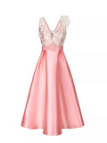 Floral sleeveless belted midi dress front view in orange pink