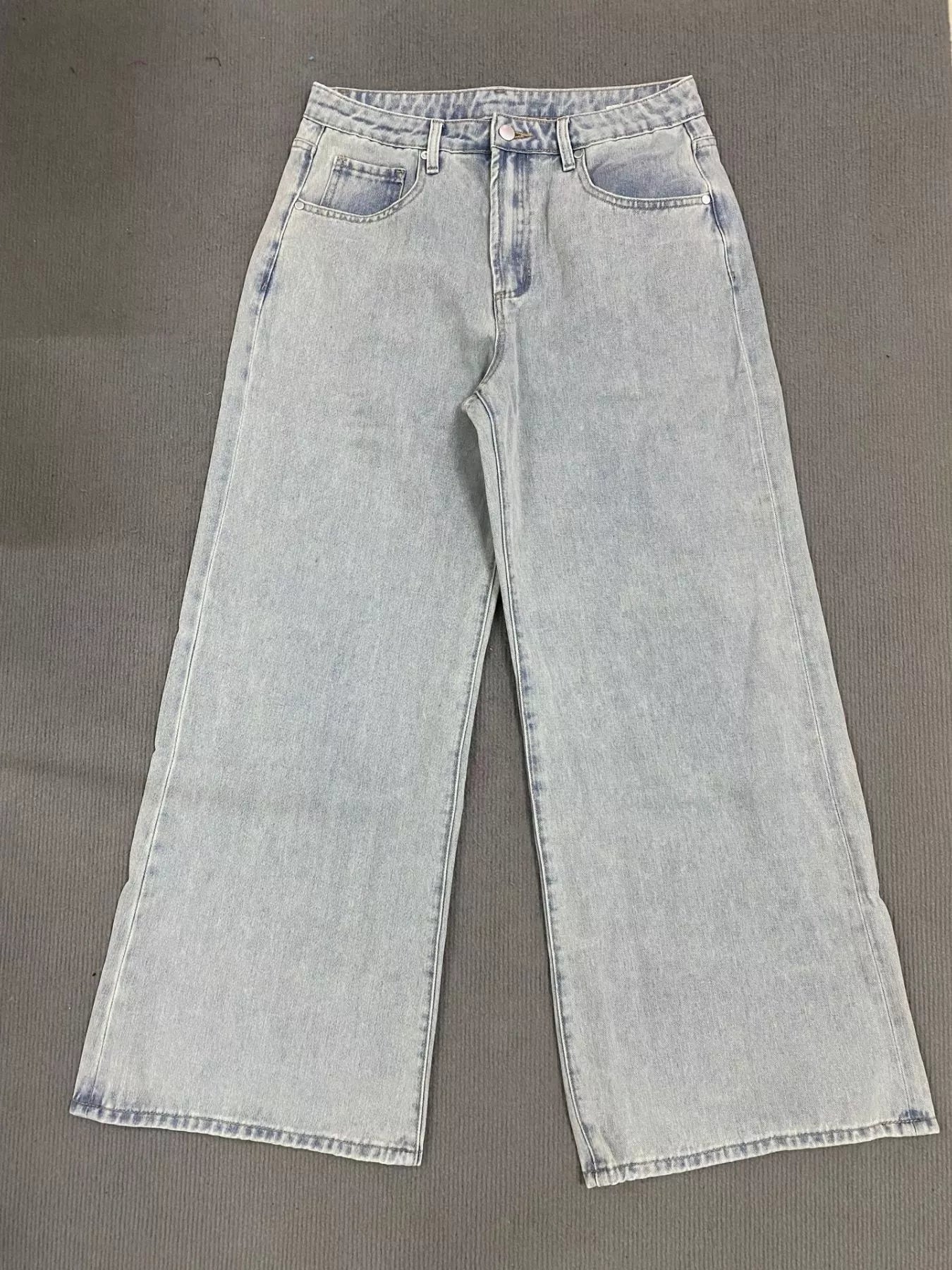 Washed denim fabric detail on wide leg jeans