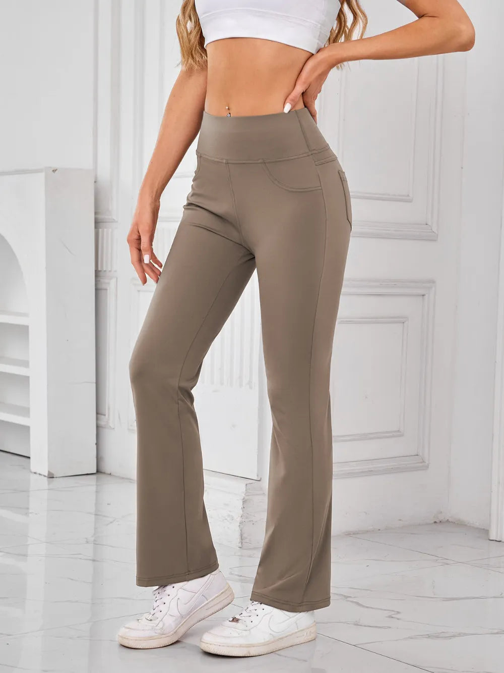 Model wearing camel active pants styled look