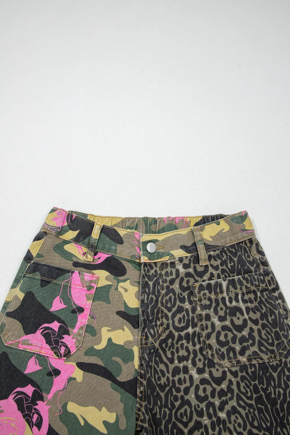 Close up of contrast patchwork prints on jeans