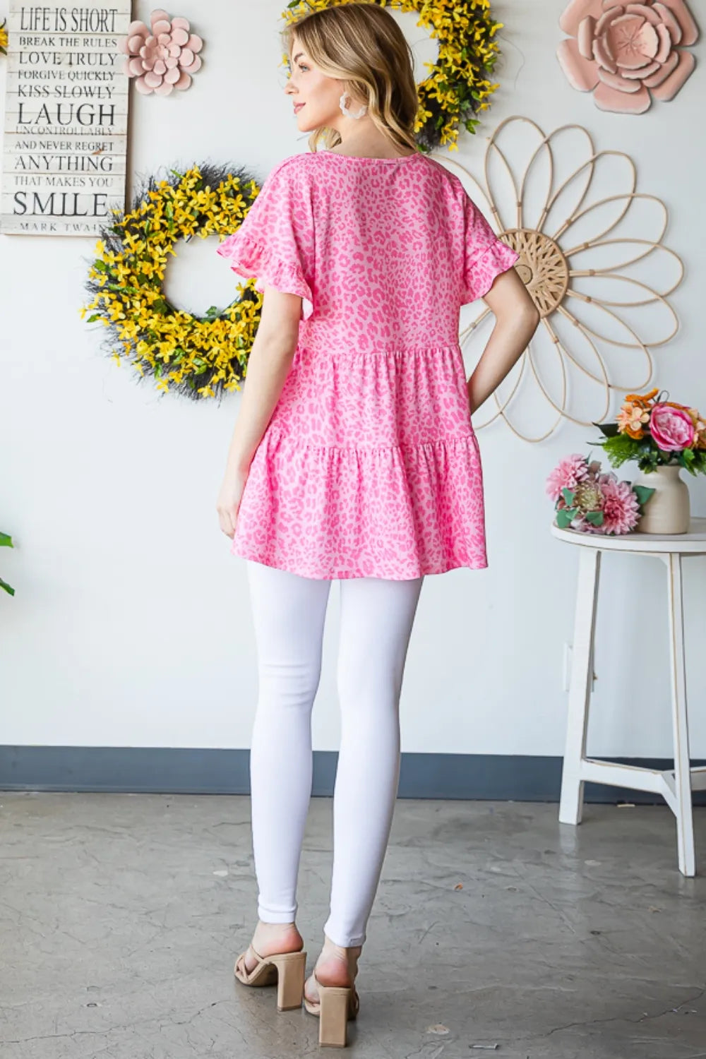 Leopard ruffle trim short sleeve top back styled view