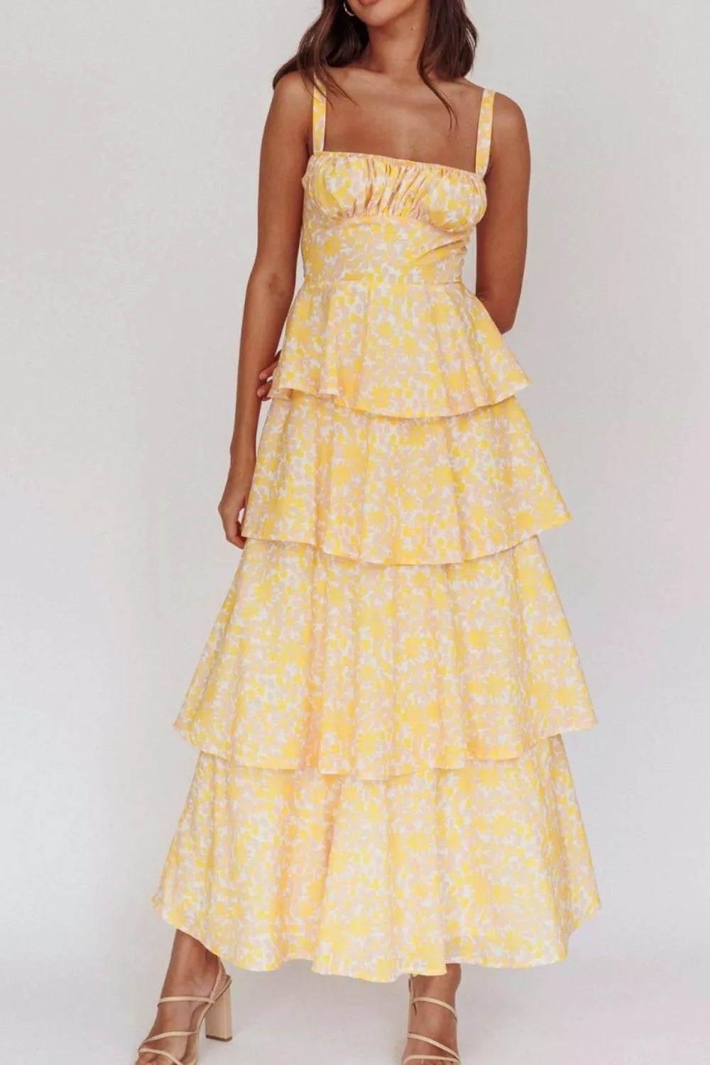 Pastel yellow tiered maxi dress on model