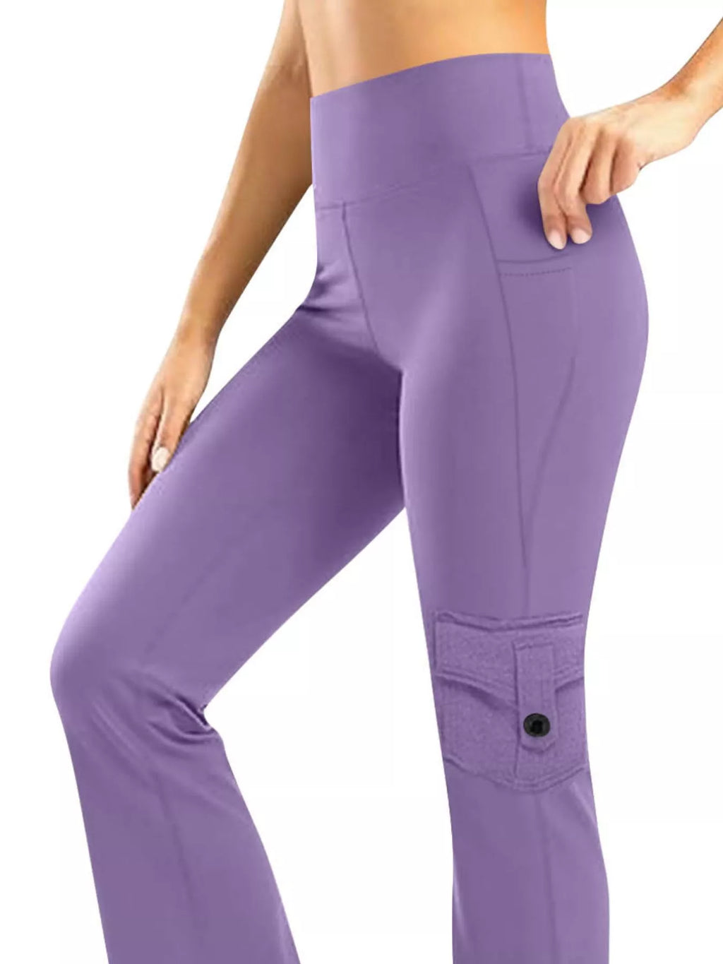 Model wearing high waisted yoga pants in a workout pose