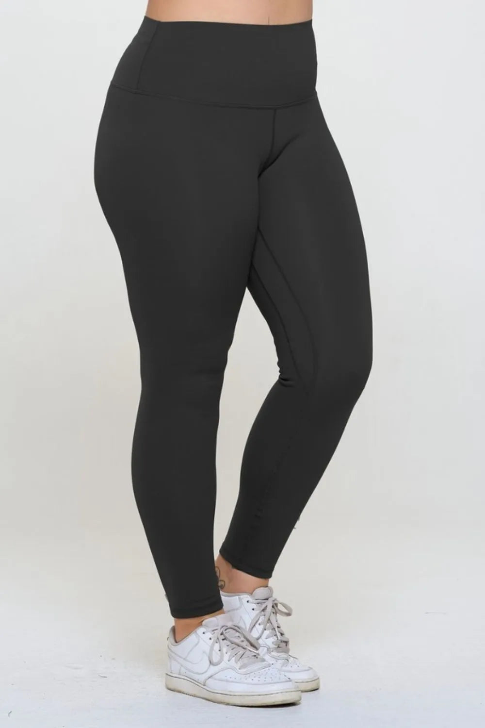 Fleece lined high waisted leggings on model side showing fit