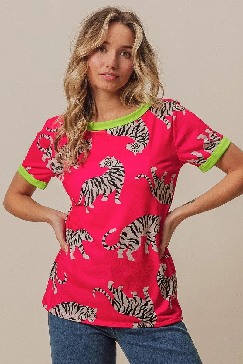 Model wearing tiger print jersey ringer top