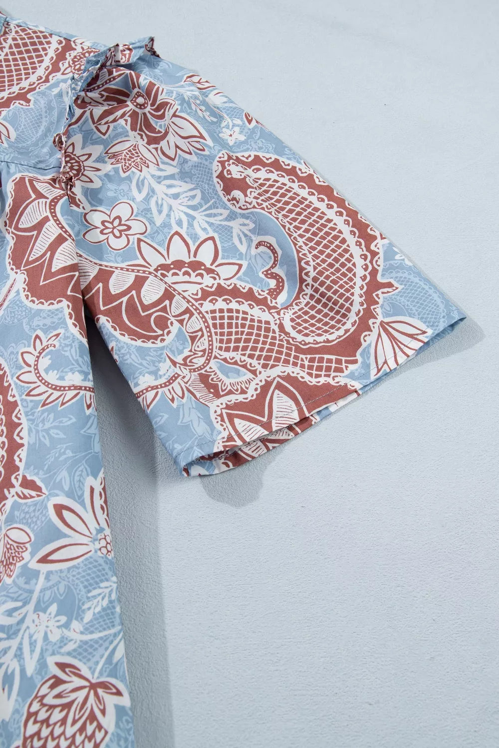 Scalloped trim floral shirt fabric texture