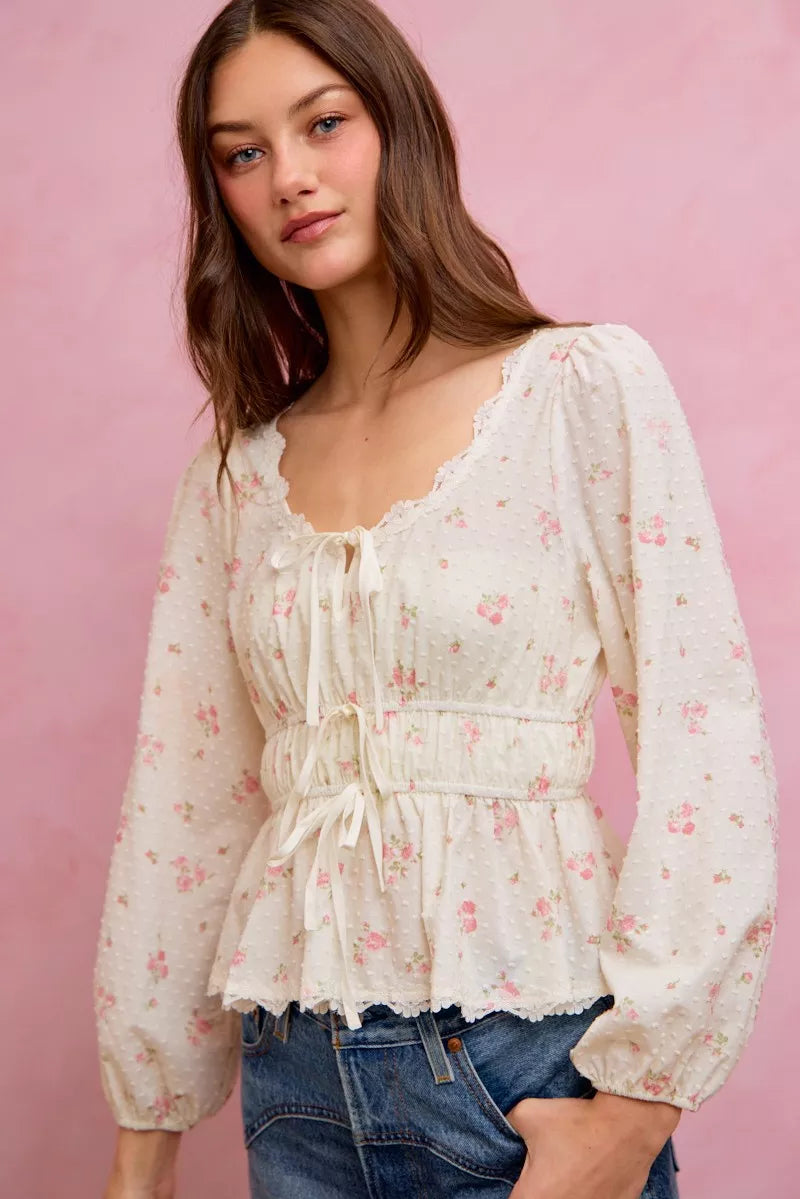 Lace trim ruched blouse on model close up
