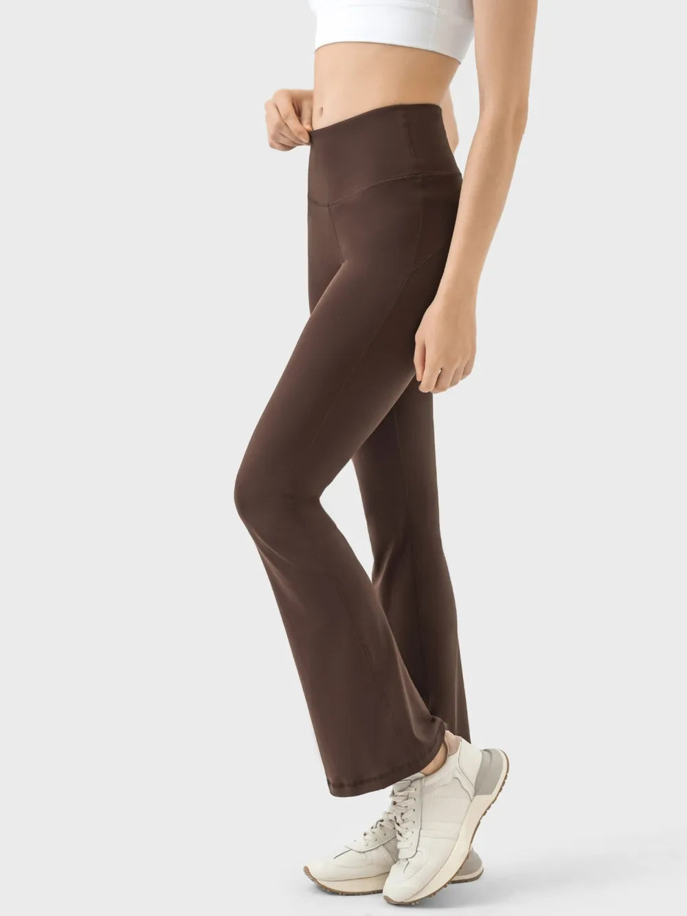 Detail of turquoise active pants stretch fabric