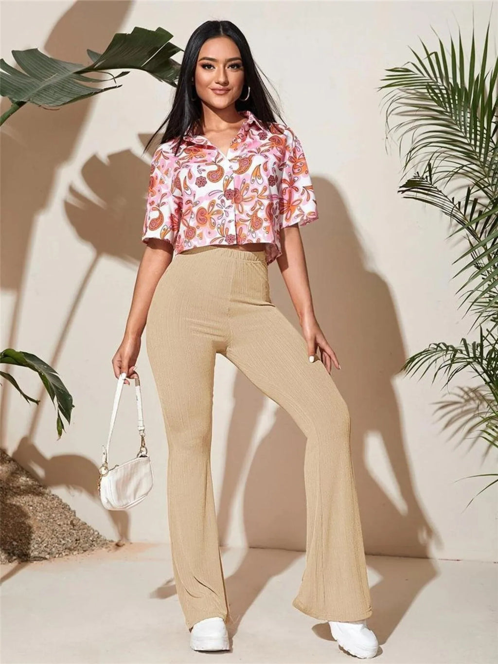 High waist flare pants standing pose