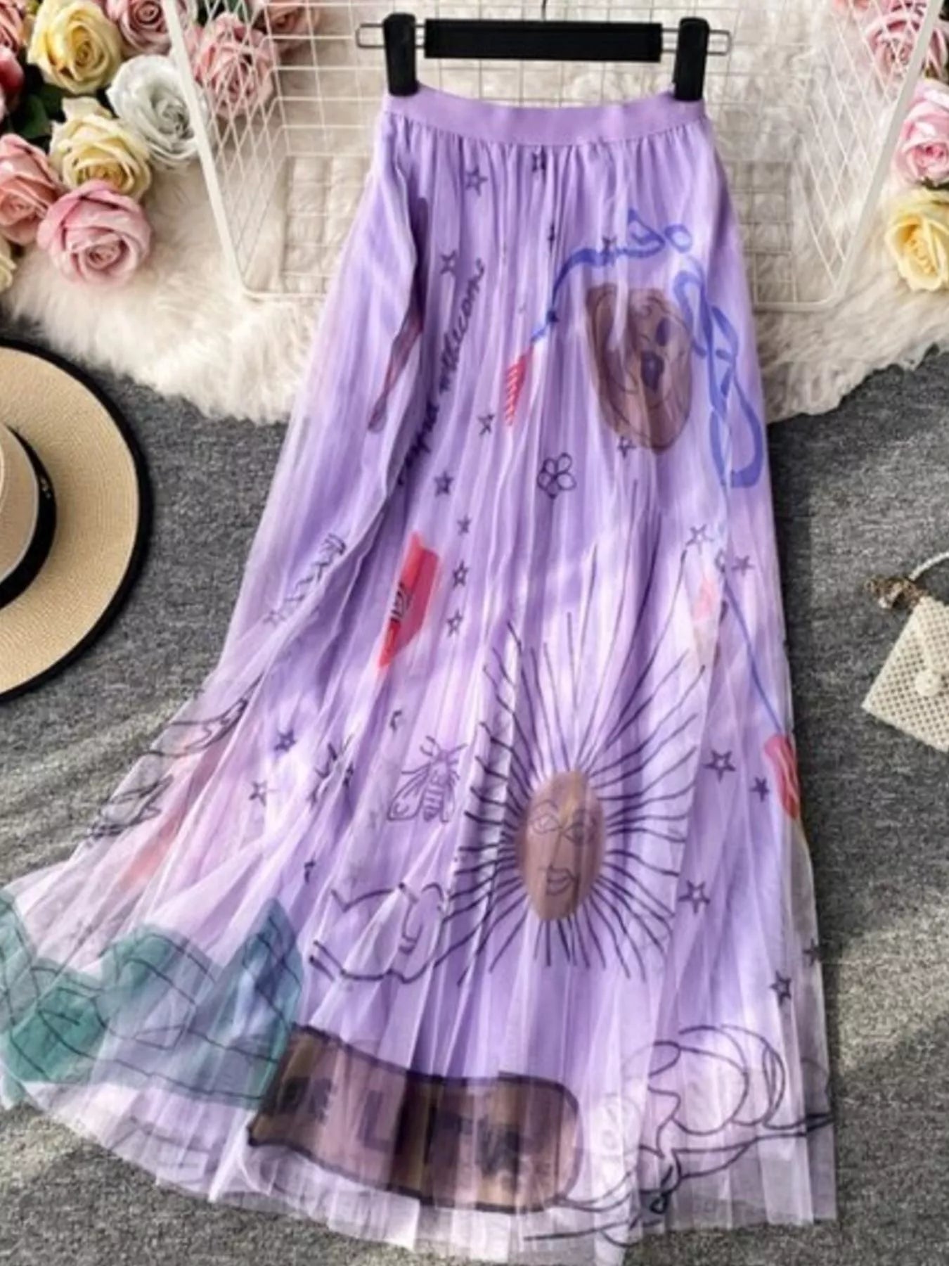 Model wearing printed tulle skirt