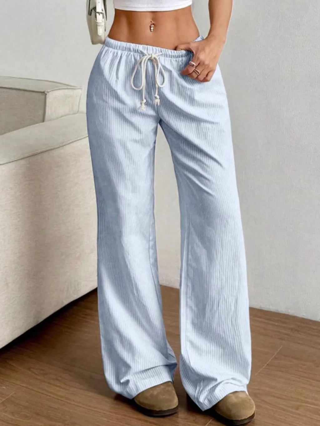 Light blue striped pants on model