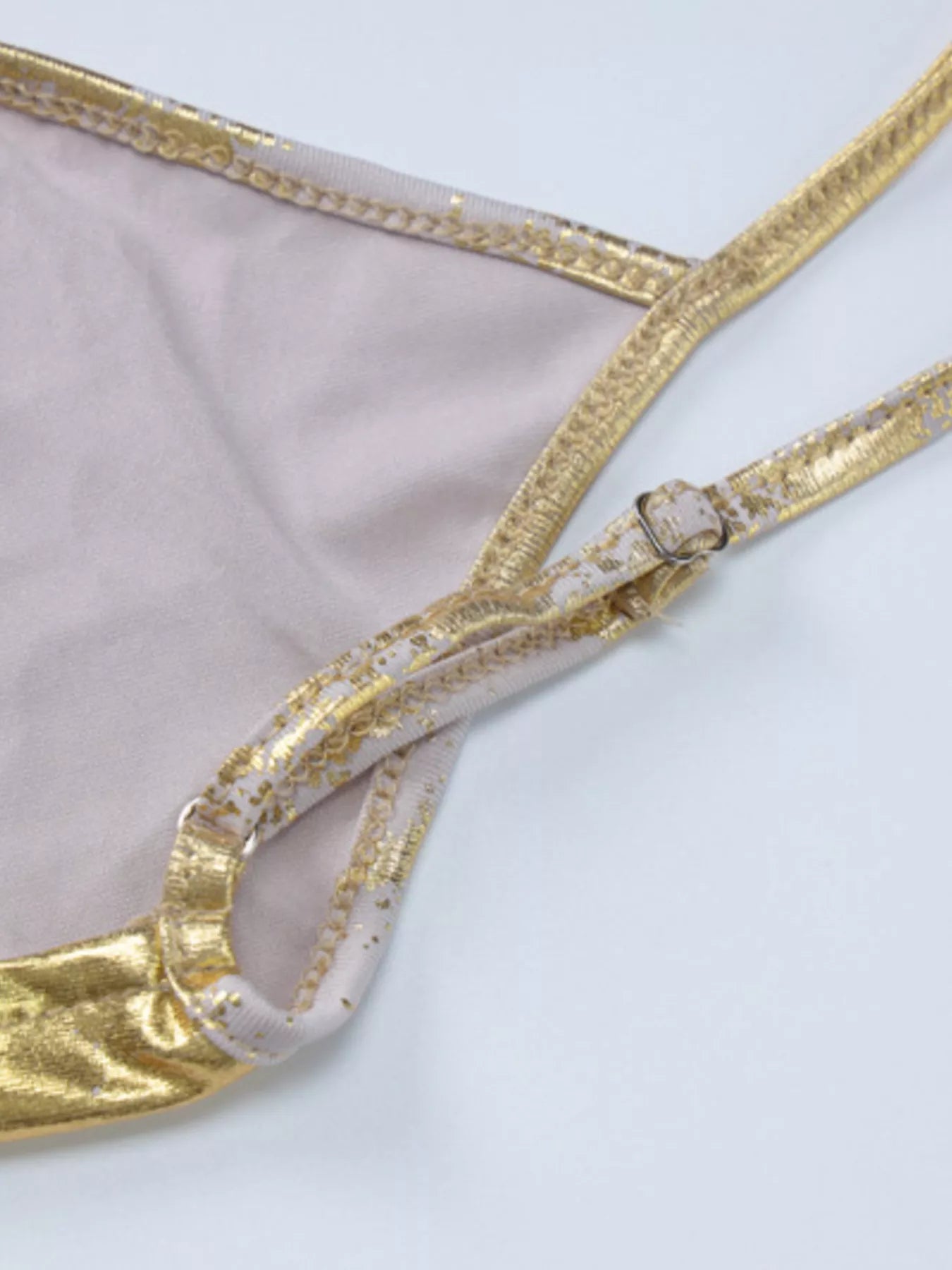 Fabric drape detail on gold maxi dress