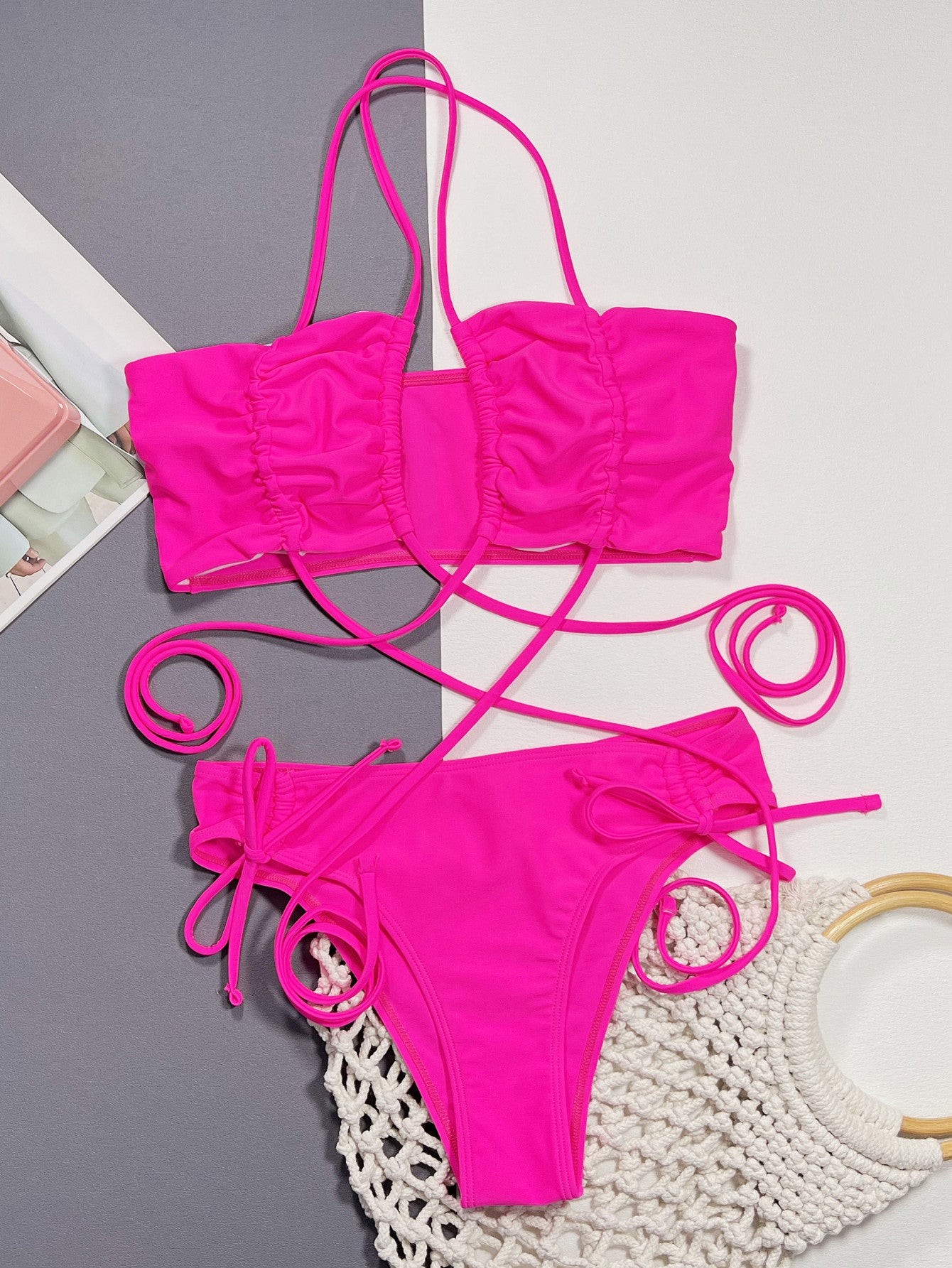 Drawstring detail on hot pink bikini bottoms