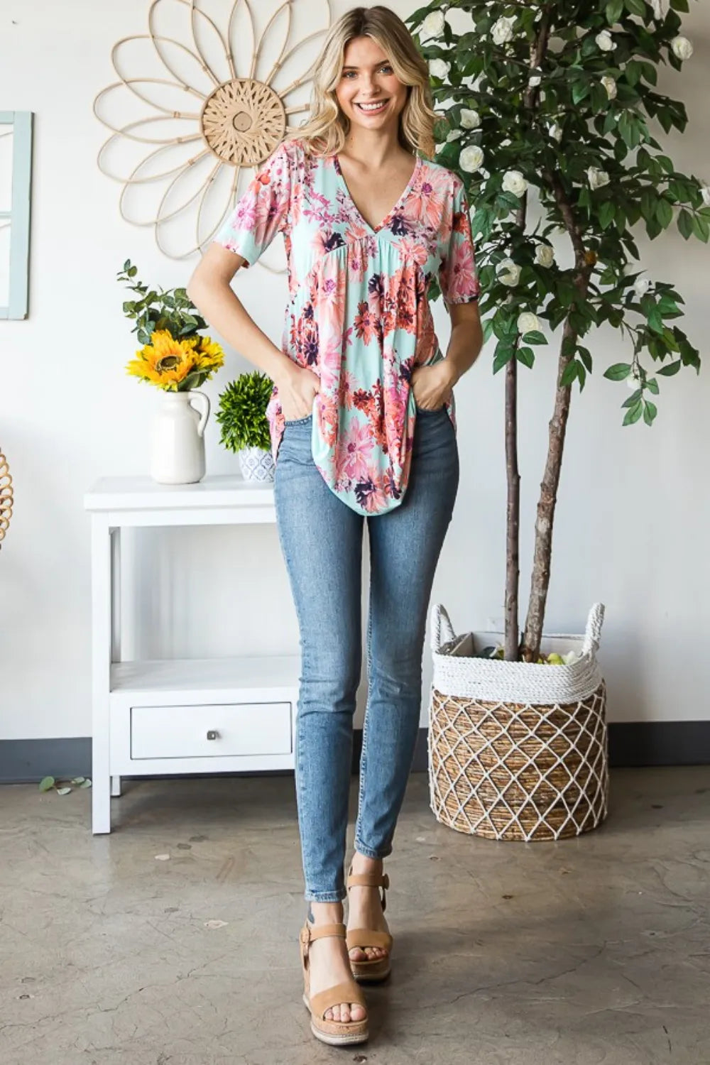 Mint floral V neck babydoll blouse full length on model