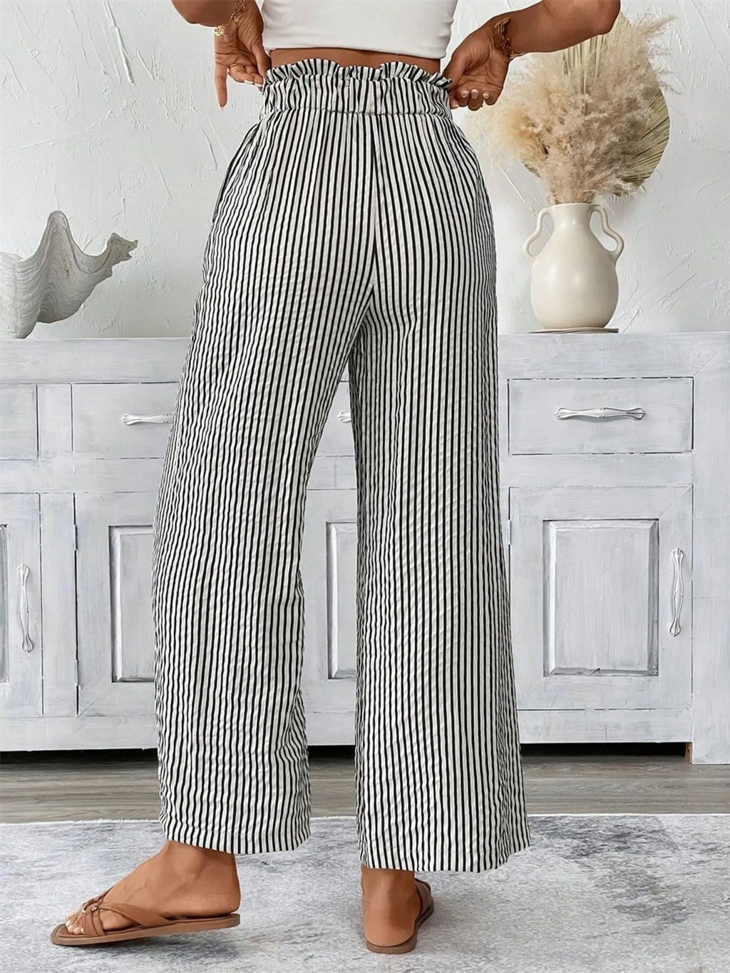 Black paper bag pants detail of tie waist