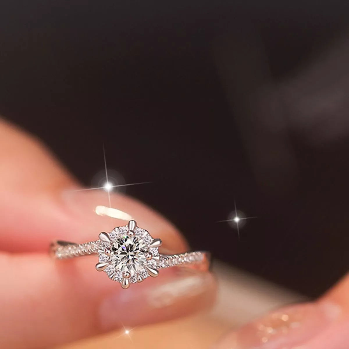 Adjustable moissanite ring set worn on a hand