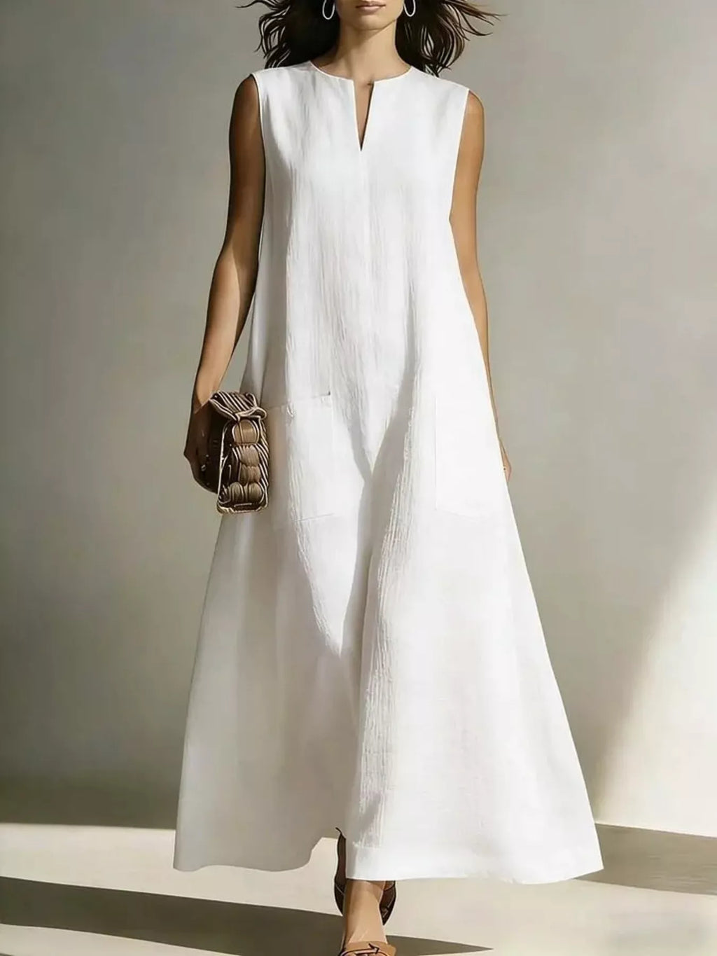 Notched neck sleeveless maxi dress front view on model