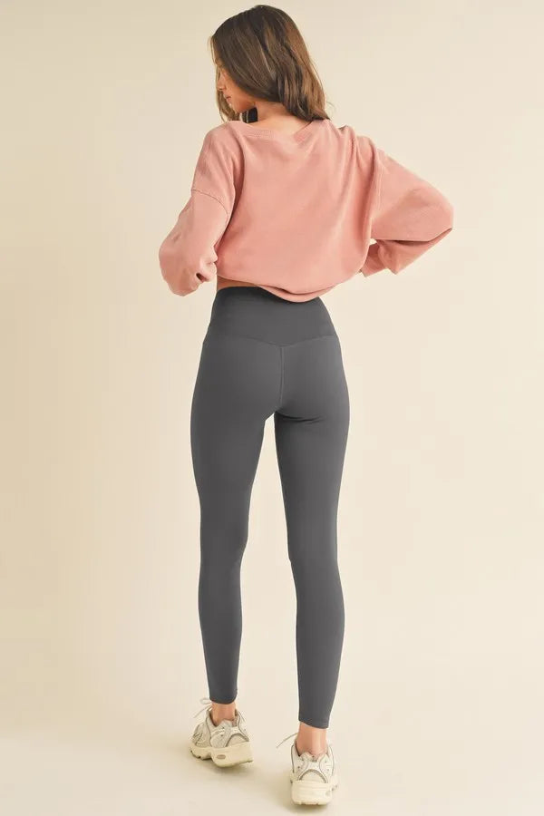 High waisted fleece leggings side view showing fit
