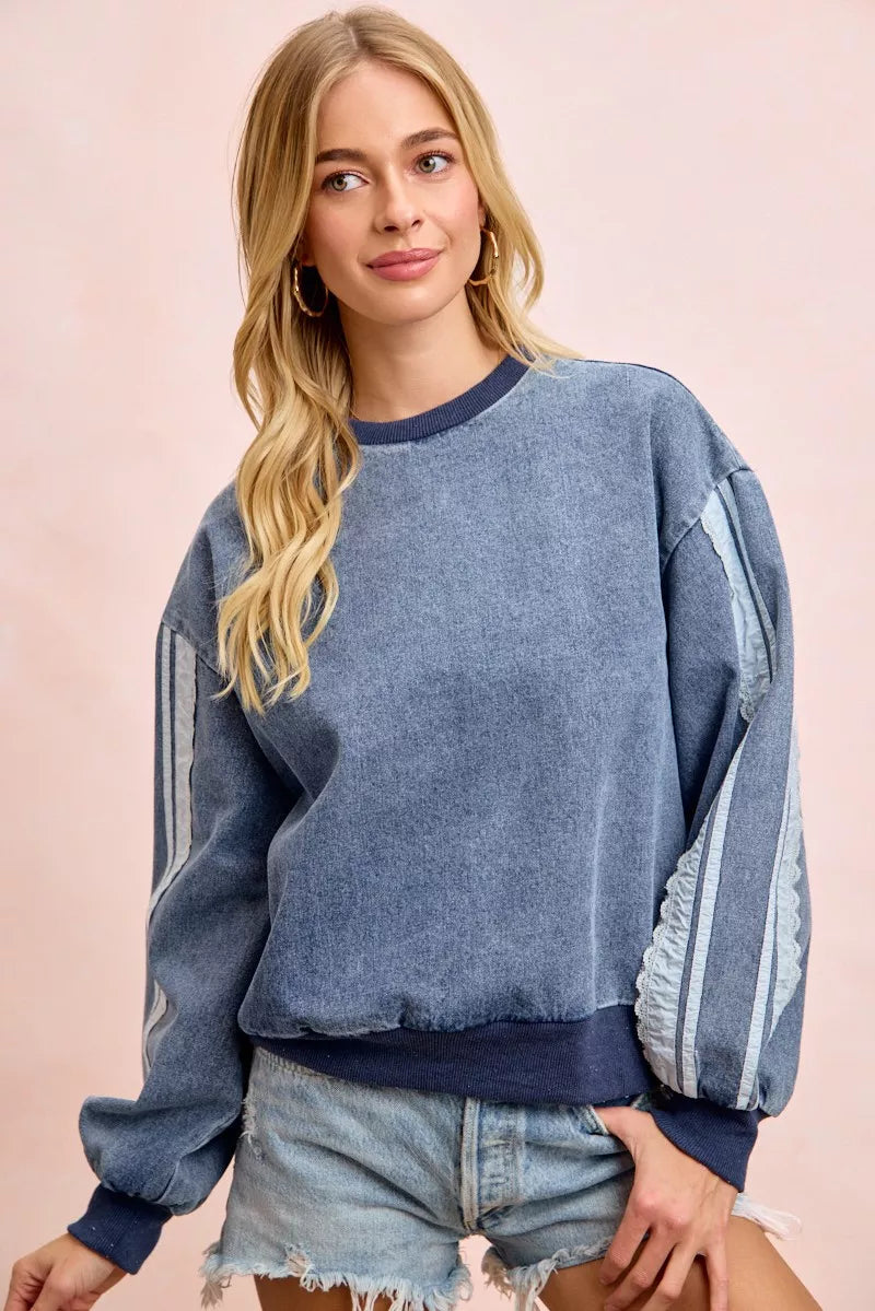Washed denim lace contrast side sweatshirt front view on model
