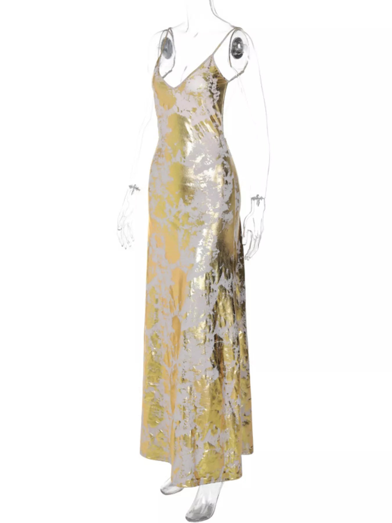 Fluid skirt movement on gold maxi dress