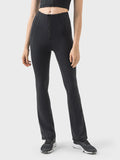 High waisted active pants with zipper detail front view