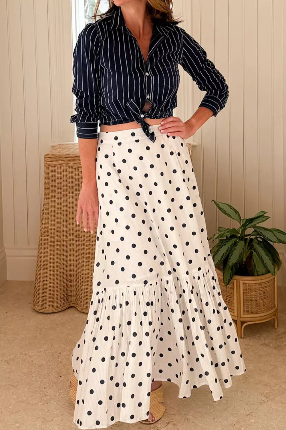 Polka dot slit maxi skirt worn on model