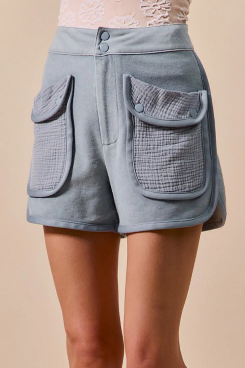 High rise terry shorts styled on model