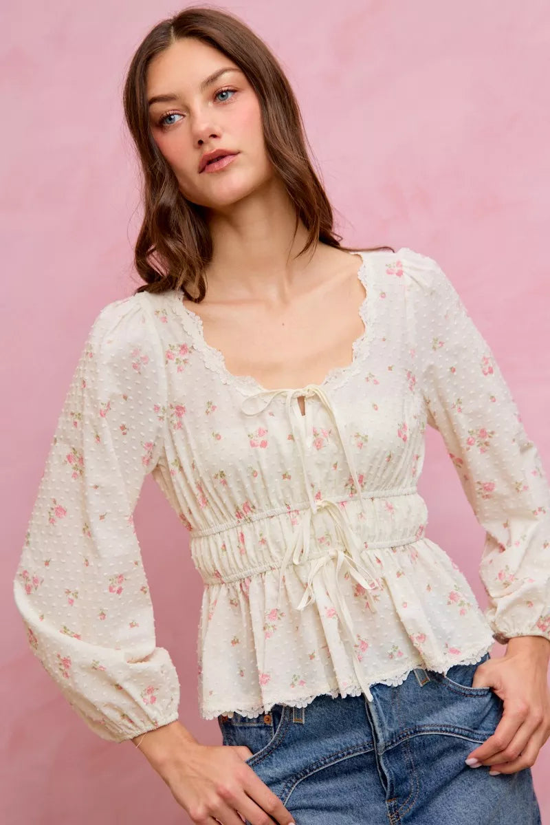 Feminine floral blouse front detail view