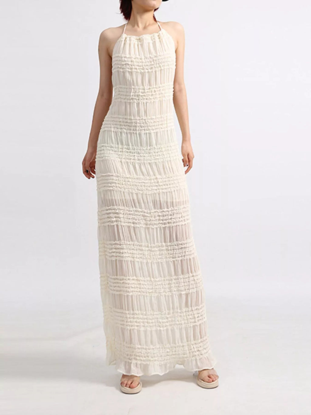 Halter neck maxi dress on model side view