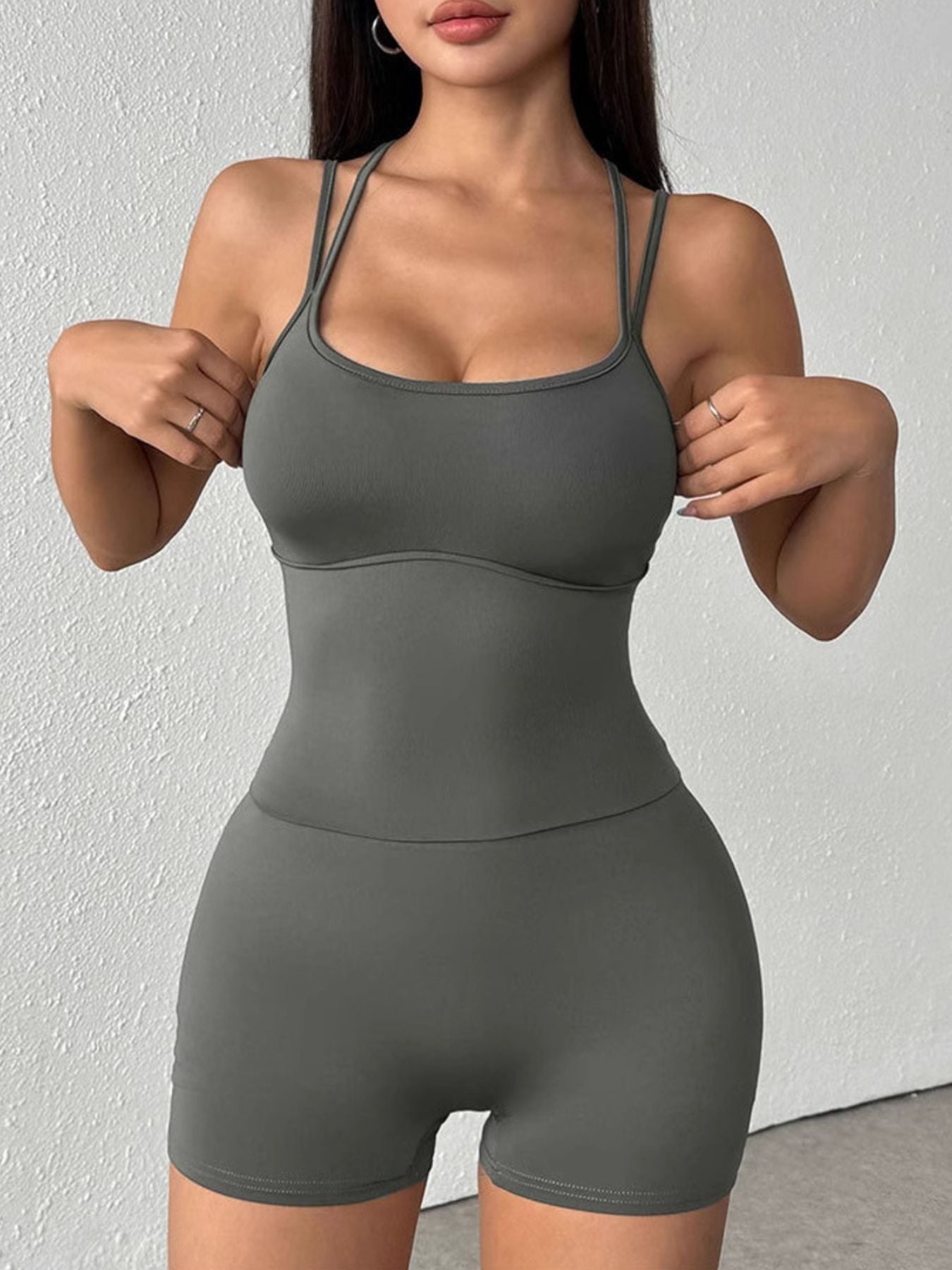 Active romper side view showing double straps