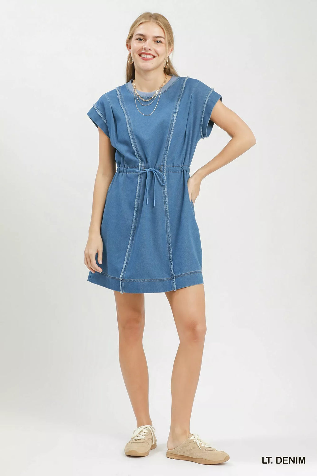 Denim mini dress back view on model