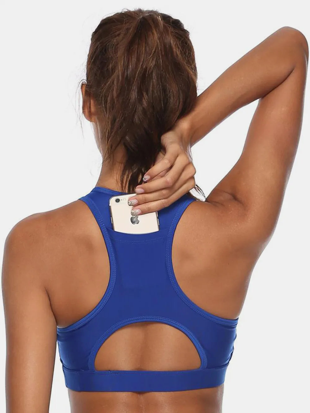 Model wearing cutout active tank