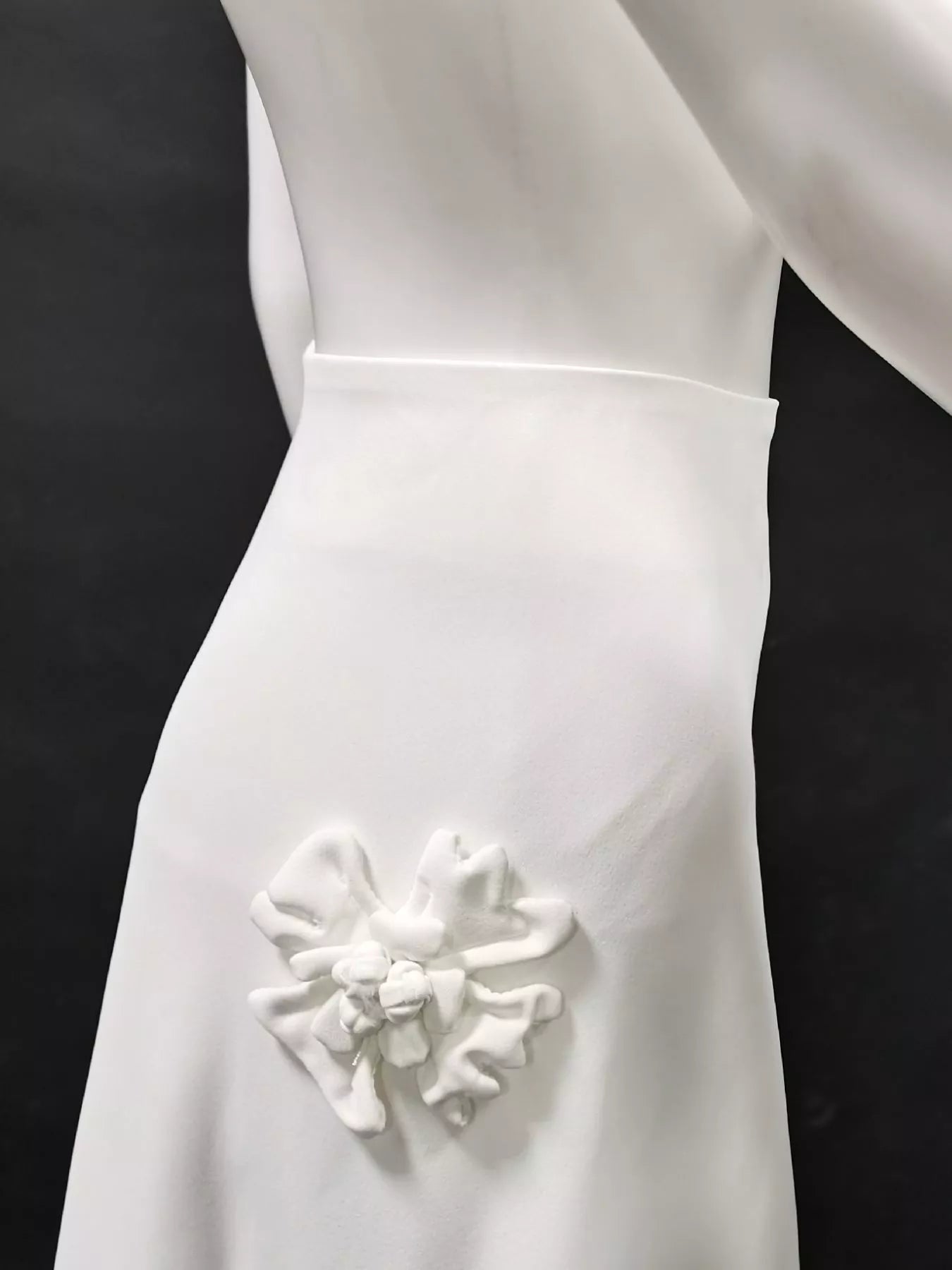 White embellished skirt worn with fitted top