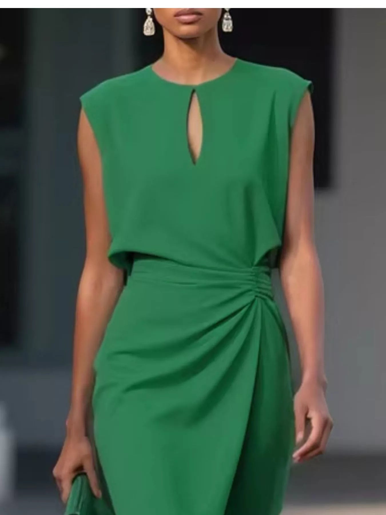 Model wearing ruched waist sleeveless dress