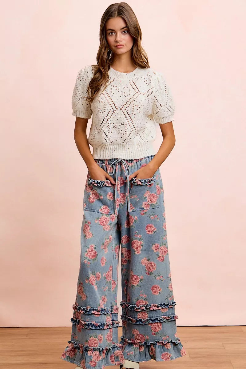 Floral washed denim wide leg pants detail view