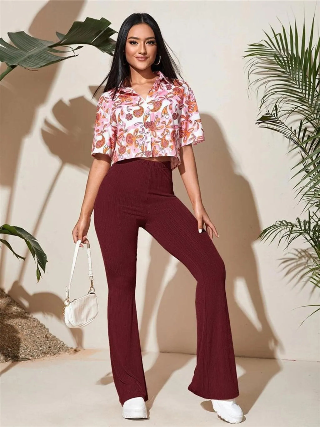 High waist flare pants styled on model