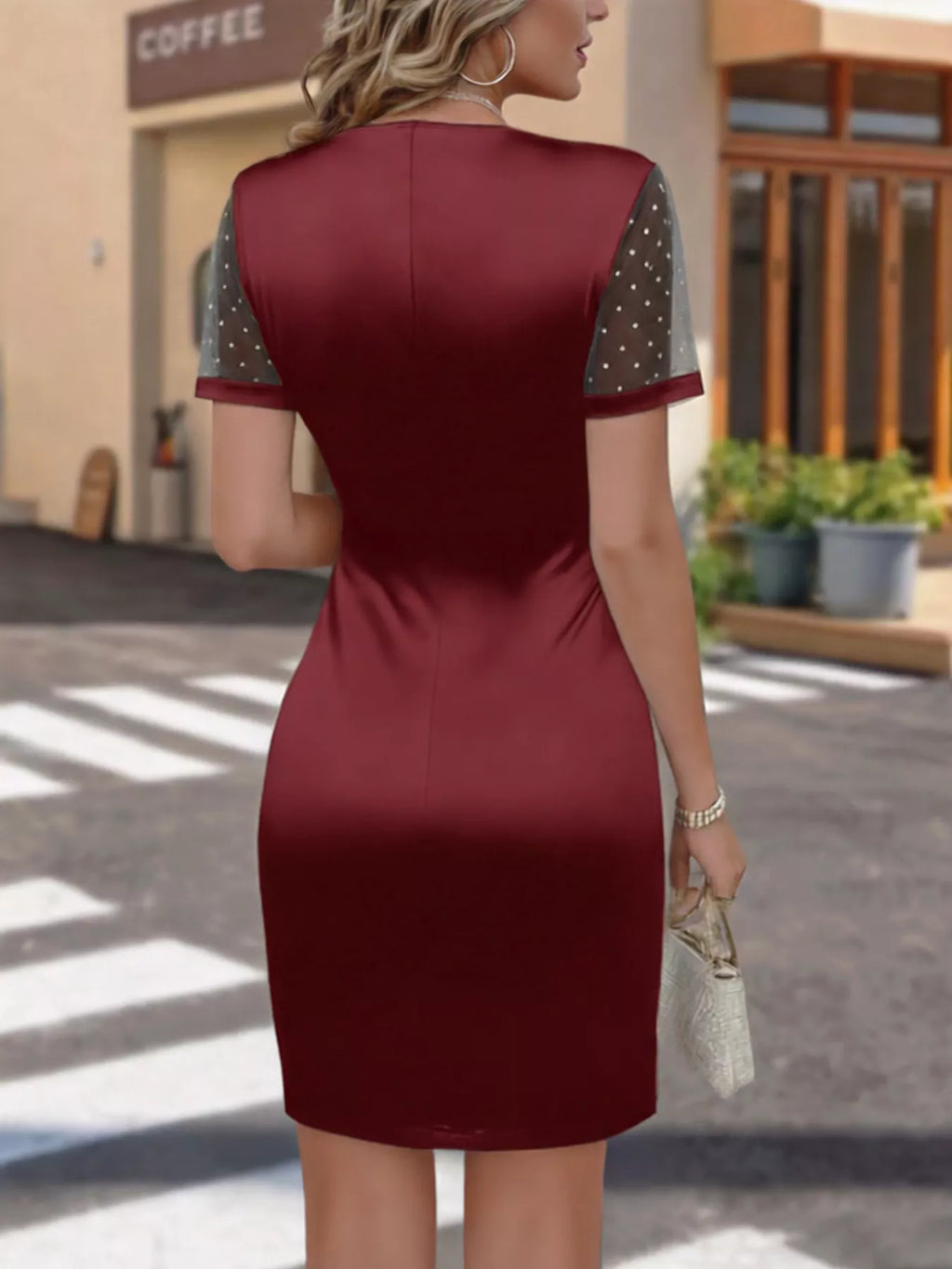 Black satin wrap dress side view