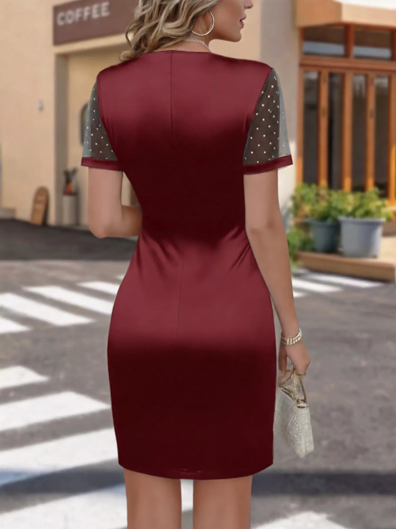 Black satin wrap dress side view