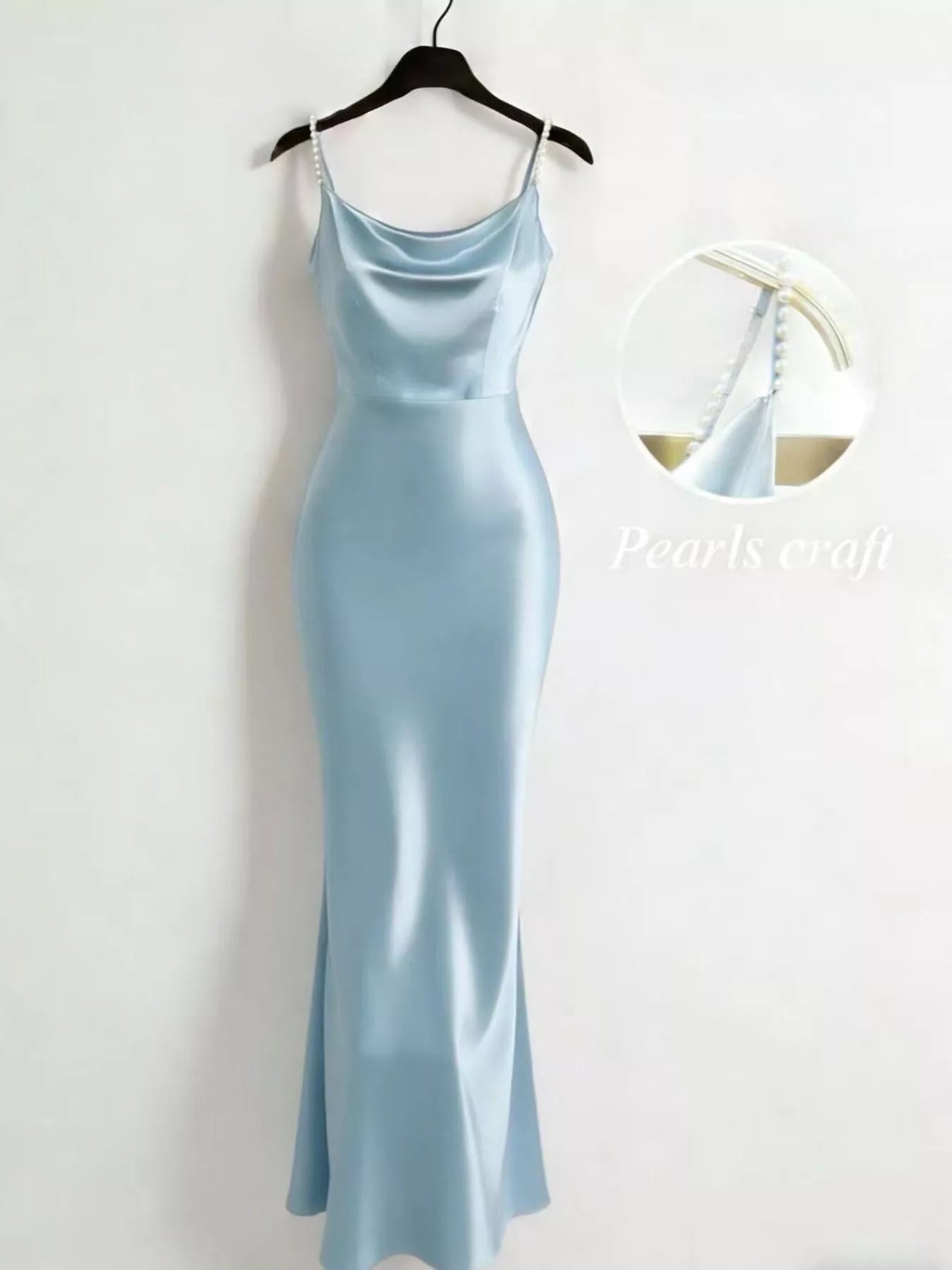 Draped cowl neckline detail on satin dress