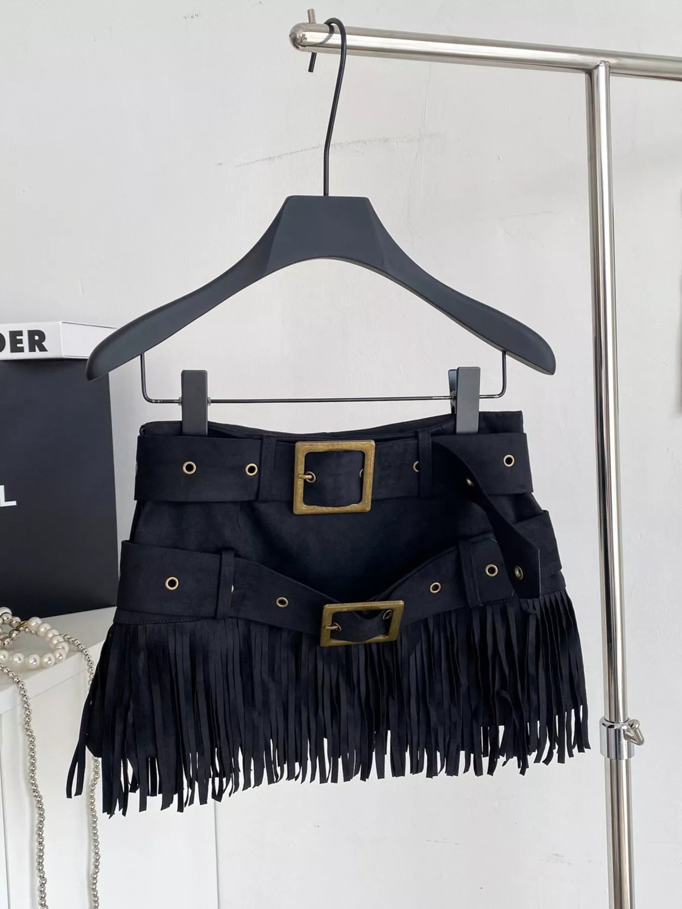 Mini skirt in black with fringe trim