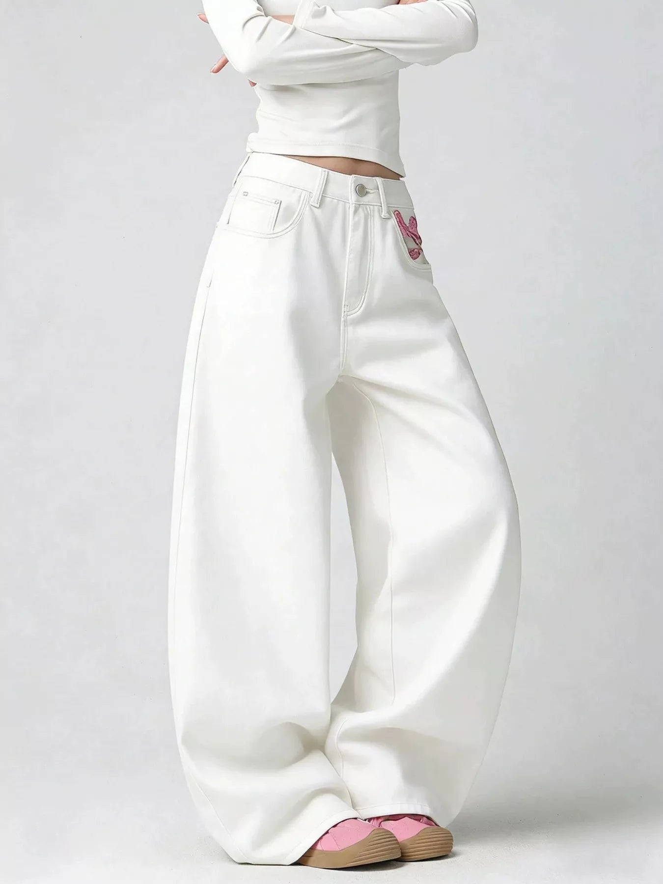 Embroidered white jeans back view