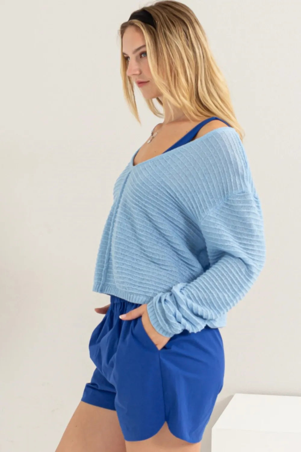 V neck striped long sleeve top on model side view