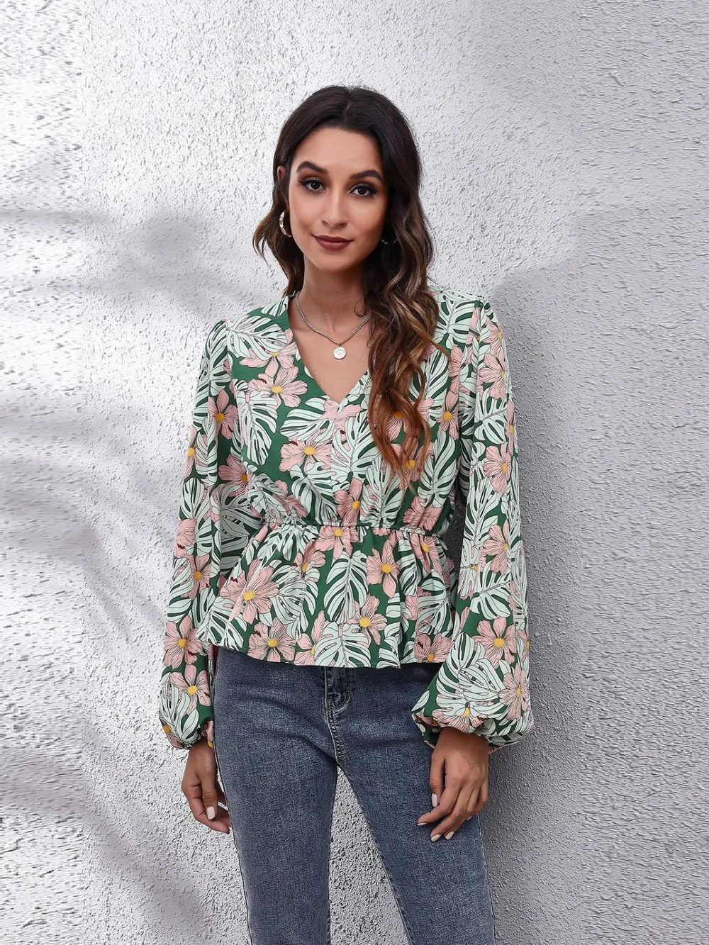 Floral V neck balloon sleeve peplum blouse front view